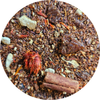 Mezcla de té rooibos con trozos de canela, jengibre deshidratado y pétalos de flor naranja.