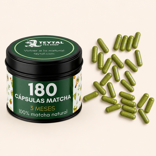 Envase negro con etiqueta verde que indica 180 cápsulas de matcha natural y cápsulas verdes sueltas al lado.
